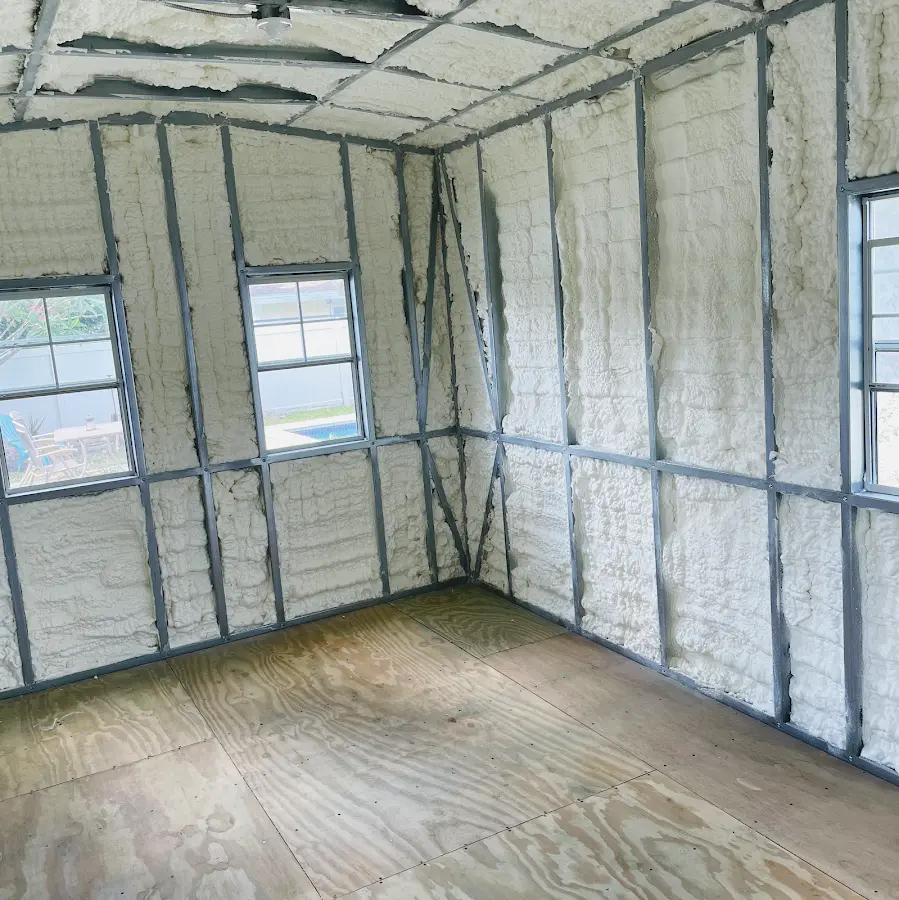 Closed-cell spray foam insulation applied to wall cavities in a residential project in North Bend